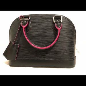 Louis Vuitton Alma BB handbag. Epi leather,textured cowhide.